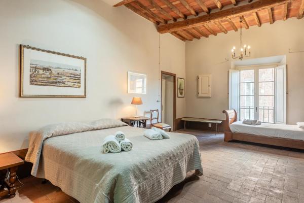 Auf dem Foto ist das Objekt Anfiteatro Luxury Rooms - Affitti Brevi Italia in der Stadt Lucca zu sehen.