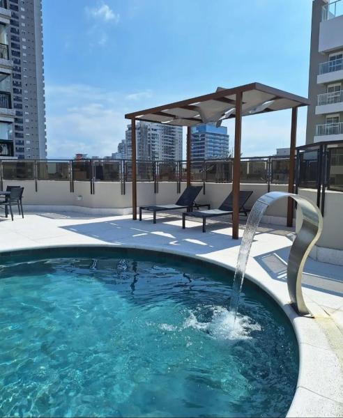 A la foto es mostra l'objecte Lindo Flat no Edifício Cosmopolitan, com GARAGEM e PISCINA situat a la ciutat de Santos.
