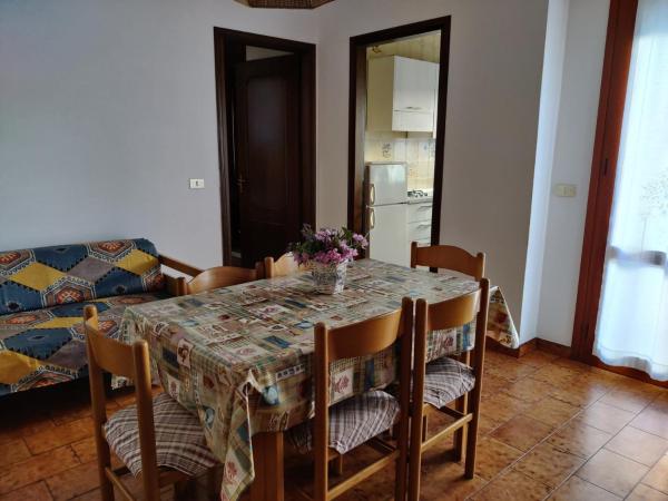 На фото показан объект Comfy flat near the beach, расположенный в городе Каорле.