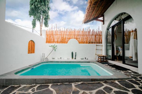 Nella foto è visibile l'oggetto Villa Sakinah Private Pool by Masterpiecevilla situato nella città di Batu.