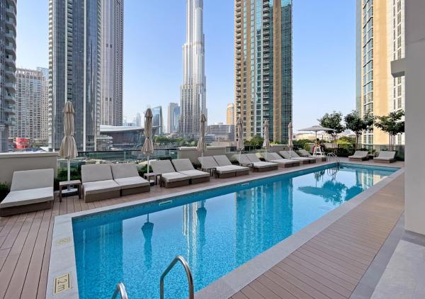 På billedet ses objektet Lux 1 BD Apartment, 2 Min walk to Dubai Mall & Burj Khalifa - Act One Tower beliggende i byen Dubai.