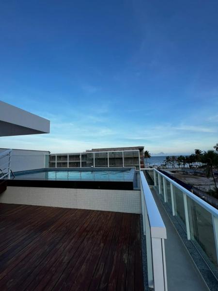 Na fotografii je vidět objekt Apartamento aconchegante de 3/4 na beira da praia! nacházející se ve městě Ilhéus.