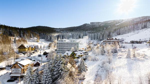 A la foto es mostra l'objecte Aparthotel Biała Perła - Czarna Góra Resort, Sun & Snow situat a la ciutat de Sienna.