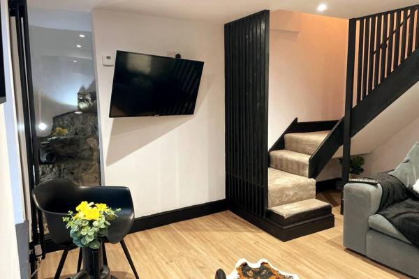 Na zdjęciu widoczny jest obiekt Cosy Cottage By MGroupSA położony w mieście Aberdare.
