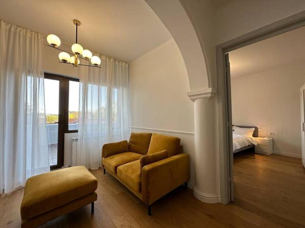 A la foto es mostra l'objecte Cozy Apartment - 30 sqm terrace situat a la ciutat de Bucarest.