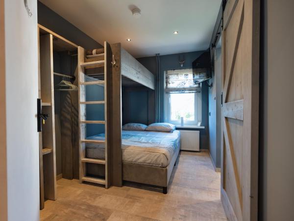 A la foto es mostra l'objecte Familiekamer bij B&B Gezond aan Zee - Toegang wellnesstuin meerprijs situat a la ciutat de Ouddorp.