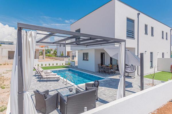 A la foto es mostra l'objecte Holiday house with a swimming pool Vodice - 21991 situat a la ciutat de Vodice.