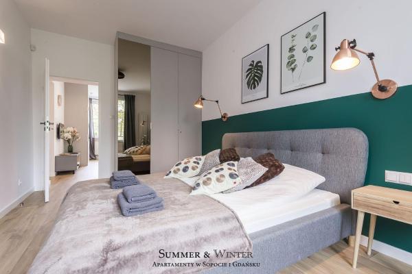 På billedet ses objektet SummerWinter - Luxury Green Old Town Apartment, 2 Bedrooms & Sofa beliggende i byen Gdańsk.