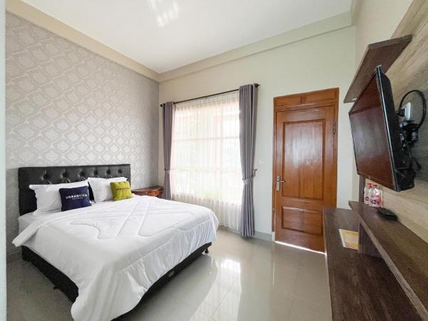Nella foto è visibile l'oggetto Urbanview Syariah Hotel Kanigara Batu situato nella città di Batu.