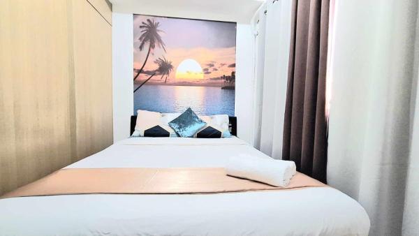 A la foto es mostra l'objecte Stylish 1BR with Wifi and Queen size bed in Grace Res situat a la ciutat de Manila.