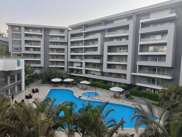 Nella foto è visibile l'oggetto Parkside Boutique 3 BBR Serviced Apartment - Ocean Blue - Near Airport situato nella città di Il Cairo.