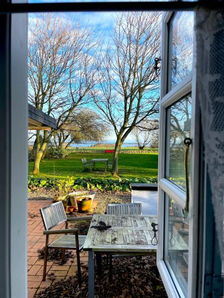 A la foto es mostra l'objecte pallisgaard B&B situat a la ciutat de Venø By.