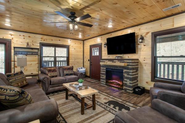 A la foto es mostra l'objecte Bear Hollow Lodge HotTub FirePit GameRoom MORE situat a la ciutat de Sevierville.