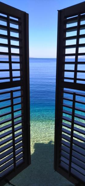 A la foto es mostra l'objecte Beach rooms Riviera - Žuta Kuća situat a la ciutat de Makarska.