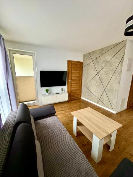 A la foto es mostra l'objecte Jurajska Plaza - Nowoczesny apartament z osobną sypialnią, KLIMATYZACJA, Parking prywatny GRATIS - Kielce situat a la ciutat de Kielce.