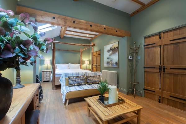 A la foto es mostra l'objecte Stable Lodge - Boutique Bed & Breakfast situat a la ciutat de Great Witcombe.