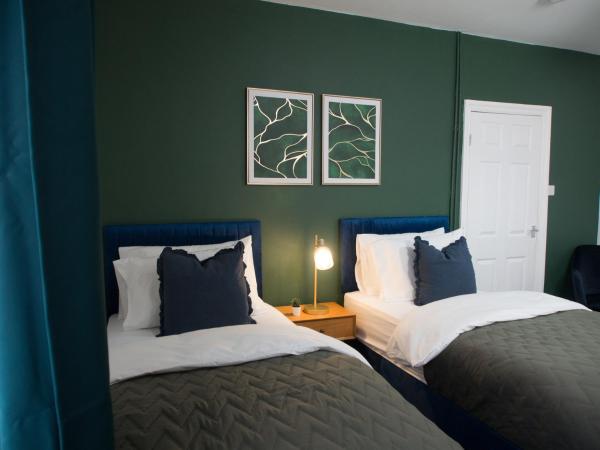 A la foto es mostra l'objecte Modern 3BR House Near Leeds City Centre situat a la ciutat de Knowsthorpe.