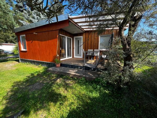 Na fotografii je vidět objekt Ferienhaus Zeulenrodaer Meer nacházející se ve městě Kleinwolschendorf.