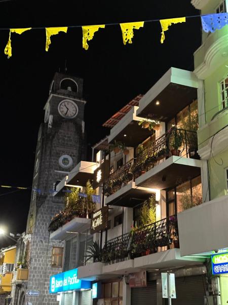 The photo shows the Hotel Agave Baños located in the city of Baños.