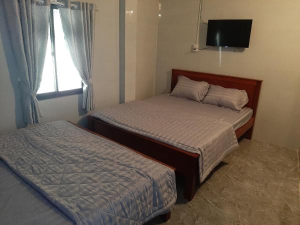 Auf dem Foto ist das Objekt Motel KIM PHÁT LUXURY - Núi Cấm in der Stadt Ngã Ba Lâm Giồ zu sehen.