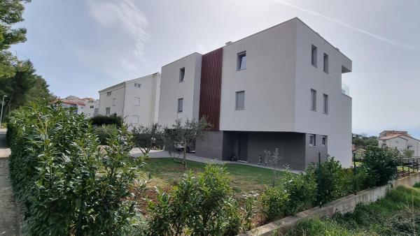 A la foto es mostra l'objecte Apartments with parking space Podstrana, Split - 22298 situat a la ciutat de Podstrana.