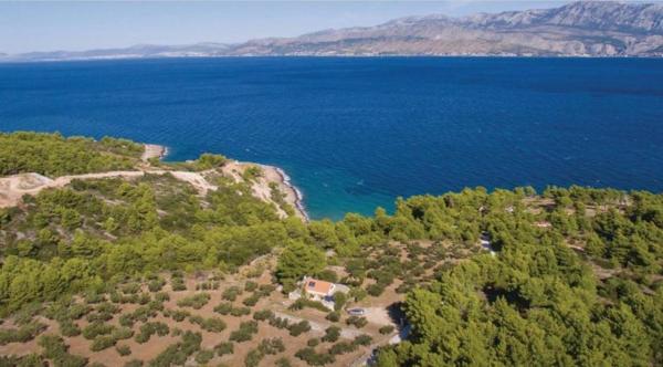 A la foto es mostra l'objecte Secluded family friendly house Cove Ducac, Brac - 14312 situat a la ciutat de Postira.