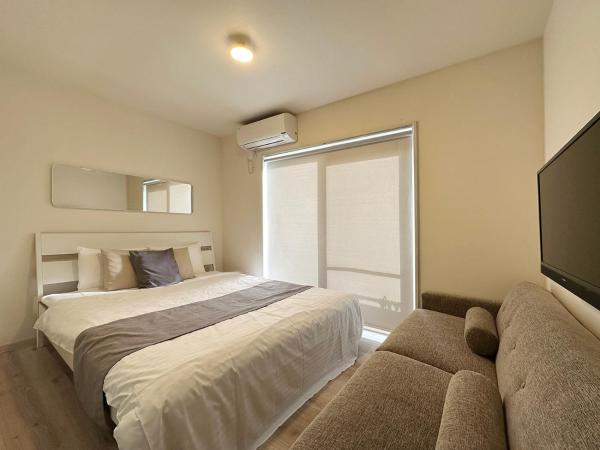 The photo shows the Yutori by b hotel - Homey w 1BR in Onomichi for 3 Ppl located in the city of Onomichi.