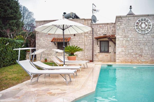 A la foto es mostra l'objecte [Luxury] Trullo da sogno immerso nella natura situat a la ciutat de Gorgofreddo.