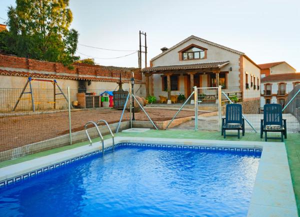 A la foto es mostra l'objecte Casa Rural El Olivar del Puerto en Cabañeros situat a la ciutat de Alcoba.
