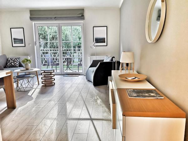 På billedet ses objektet Arboretum Apartments Kórnik beliggende i byen Czmoń.