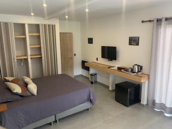 Auf dem Foto ist das Objekt chez Yannick Hospedaje Los Amigos in der Stadt Salento zu sehen.