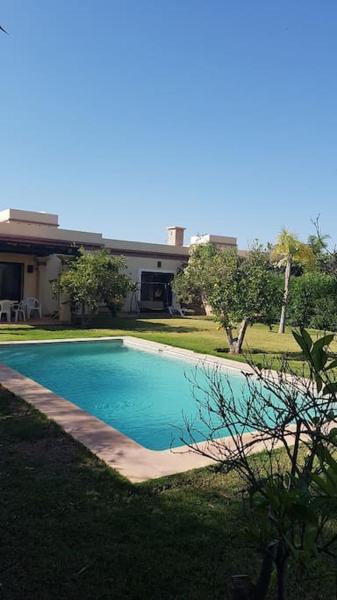 На фото показан объект Splendide villa 2 ch avec piscine privée sans vis à vis à DYAR SHEMSI, расположенный в городе Sidi Boumoussa.