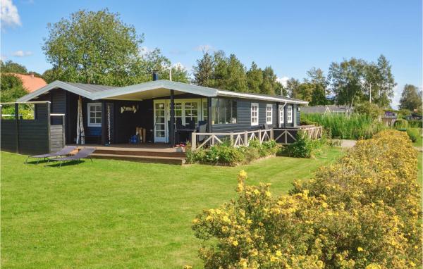 Na fotografii je vidět objekt Holiday Home Hybenvænget Vi nacházející se ve městě Hejls.