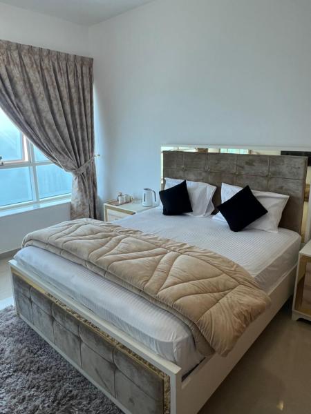 The photo shows the F30,R3,Sunrise on the beach,1room inside 3bedroom apartment,(separate washroom outside) located in the city of Ajman .