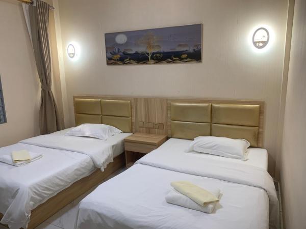 Pokój typu Superior z 2 łóżkami pojedynczymi — 20 m² - 老骆西港宾馆