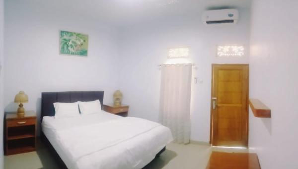 写真にはLabuhanpandan市にあるSwan Homestayが写っています。