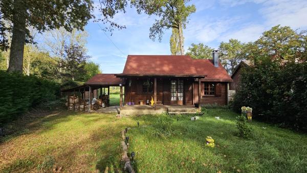 A la foto es mostra l'objecte Chalet de Béon situat a la ciutat de Dollot.