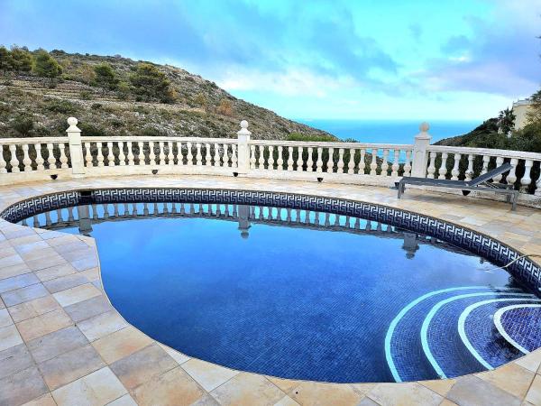 Nella foto è visibile l'oggetto Casa con piscina privada situato nella città di Benitachell.