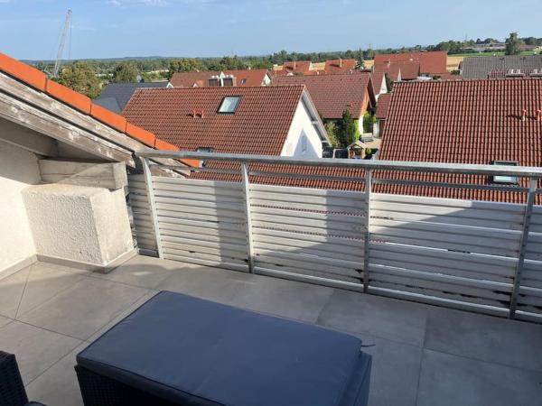 A la foto es mostra l'objecte Kirchdorf Lounge - komplette moderne Ferienwohnung mit Parkplatz situat a la ciutat de Berkheim.