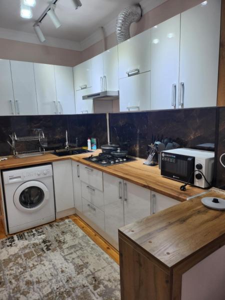 A la foto es mostra l'objecte Ул. Олтин Тепа, дом 18, кв 55. (бывш шампанский завод) situat a la ciutat de Yalanghoch.
