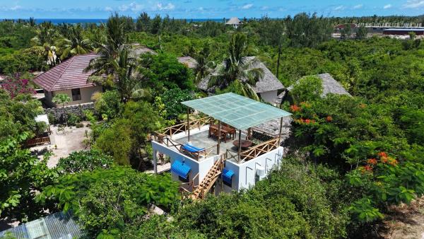 A la foto es mostra l'objecte Cozy Bungalow - Garden, Terrace, Rooftop, Beach situat a la ciutat de Bwejuu.