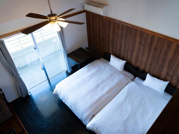 Na fotografii je vidět objekt 恩納Garden Resort Okinawa 希望が丘ビーチまで徒歩10分 nacházející se ve městě Imbu.