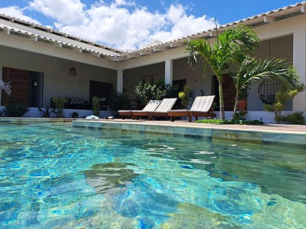 A la foto es mostra l'objecte Casa charmosa na Barrinha (Prea) perto da Praia situat a la ciutat de Aranaú.