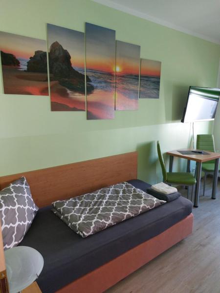 På billedet ses objektet Ferienwohnung Holzhausen beliggende i byen Leipzig.