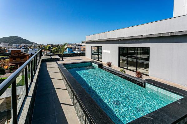 På billedet ses objektet Studio cond. com piscina 700m da praia STI108 beliggende i byen Florianópolis.