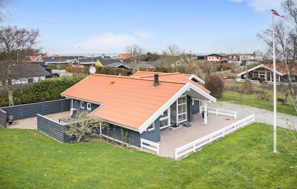 A la foto es mostra l'objecte Gorgeous Home In Otterup With Wifi situat a la ciutat de Otterup.