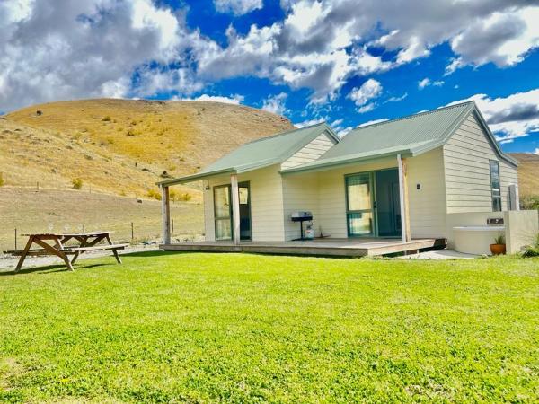 A la foto es mostra l'objecte Gold Miners Cottage situat a la ciutat de Queensberry.