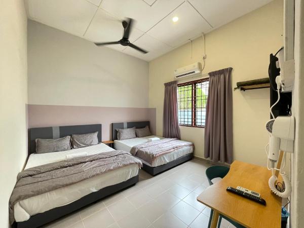 Nella foto è visibile l'oggetto Muslim Homestay Teluk Intan ( Hotel Style Room ) by Mr Homestay situato nella città di Teluk Intan.