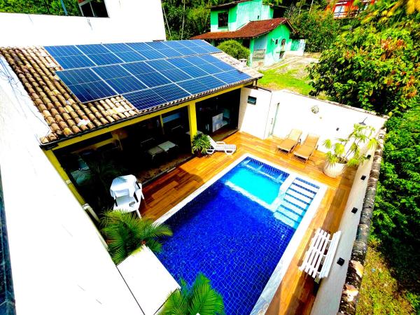 The photo shows the POUSADA OHANA PARATY located in the city of Paraty.