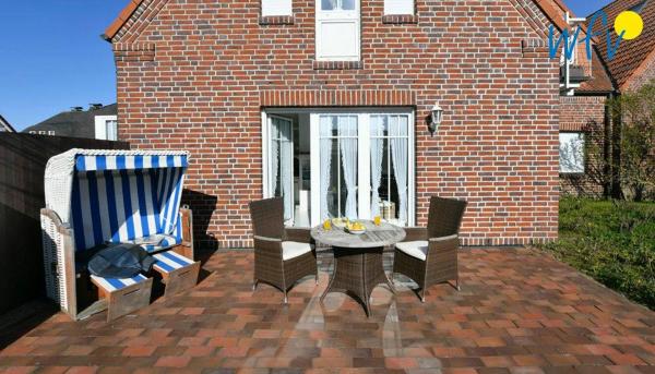 A la foto es mostra l'objecte Haus vorm Riff Ferienwohnung Memmertfeuer situat a la ciutat de Juist.